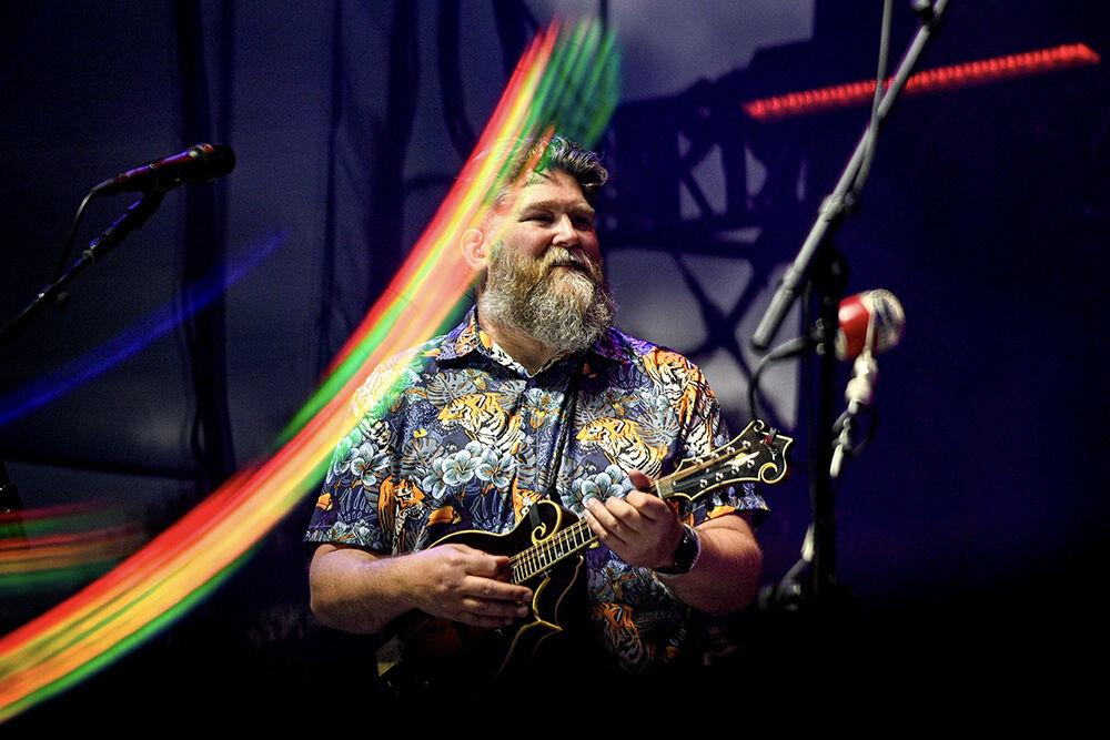 Micheal Cleveland &amp; Flamekeeper performs at IBMA Bluegrass live at the Red Hat Amphitheater on Friday, Sept. 29, 2023. Micheal Cleveland &amp; Flamekeeper is IBMA's five-time instrumental group of the year.