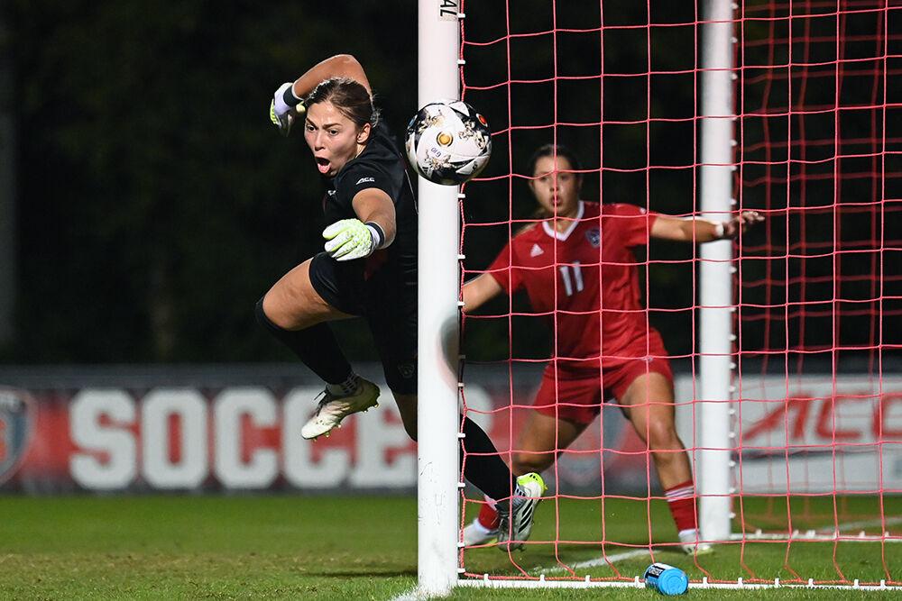 Junior goalkeeper Olivia Pratapas follows the ball out of the net during the match against UNC-Chapel Hill at Dail Soccer Field on Saturday, Sept. 30, 2023. Pratapas made eight saves for the Wolfpack. NC State lost 4-0 to Chapel Hill.