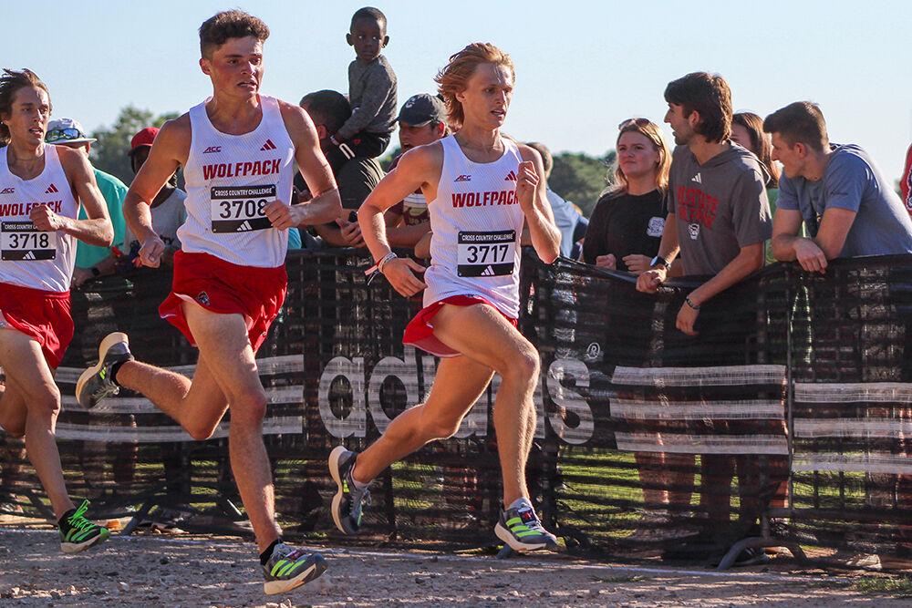 Sophmore runners Jimmy Mullarkey, Patrick Gibbons and Ryan Motondo running during the XC Adidas Challenge at WakeMed Soccer Park on Friday, Sept. 15, 2023. Mullarkey came in 14th place with a time of 14:18.35, Gibbons in 12th with a time of 18.32.9 and Motondo in 13th with a time of 18:33.2. The men's team won first place overall.