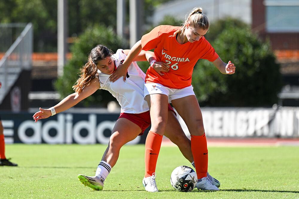 Junior defender Fernanda Soto tries to strip the ball from the Virginia offense at Dail Soccer Field on Sunday, Oct. 8, 2023. The NC State Wolfpack beat the Virginia Cavaliers 2-1.