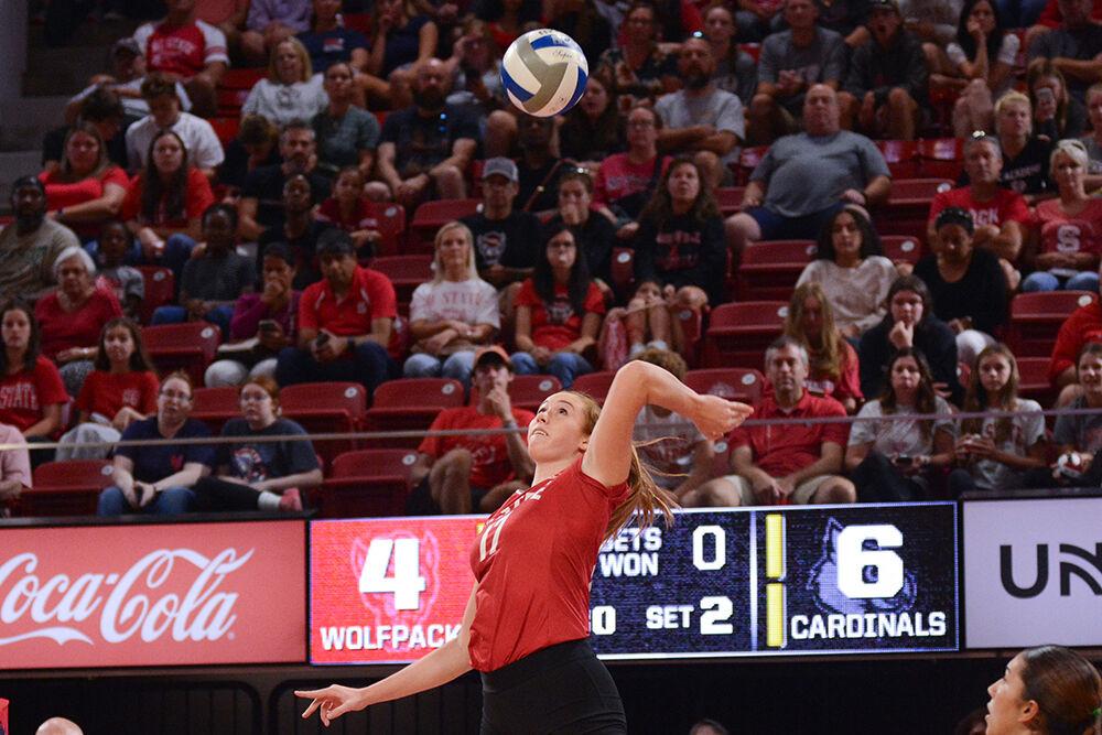 Junior opposite hitter Amanda Rice spikes the ball during the match against Louisville in Reynolds Coliseum on Sunday, Oct. 1, 2023. The Wolfpack defeated the Cardinals 3-1.