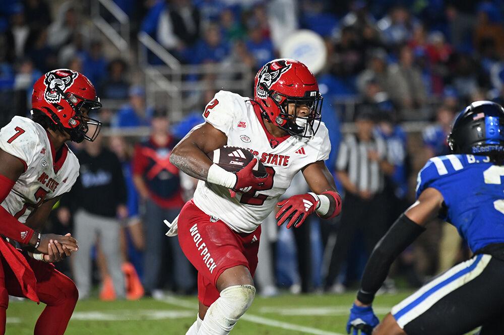 Sophomore running back Michael Allen runs the ball during the Wolfpack's game against the Duke Blue Devils at Wallace Wade Stadium on Saturday, Oct. 14, 2023. The Blue Devils defeated the Wolfpack 24-3.