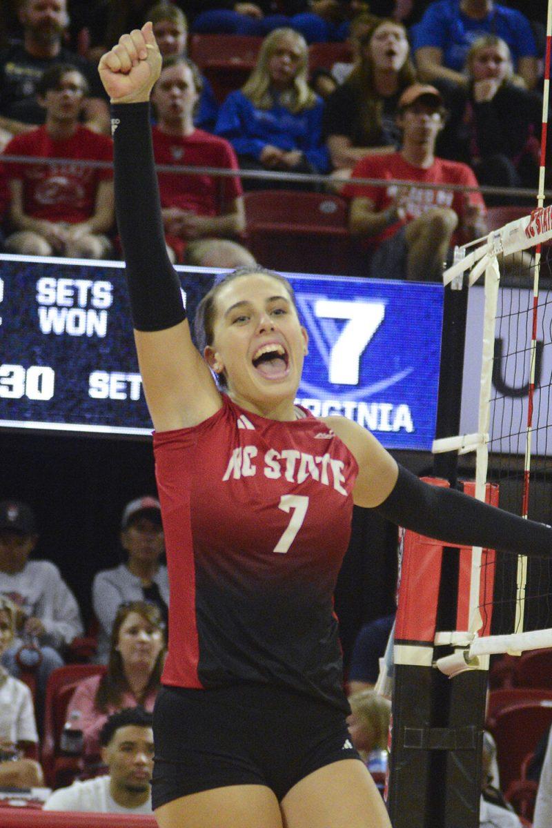 Sophomore outside hitter Ava Brizard celebrates during the match versus Virginia at Reynolds Coliseum on Sunday, Oct. 22, 2023. NC State beat Virginia 3-0.