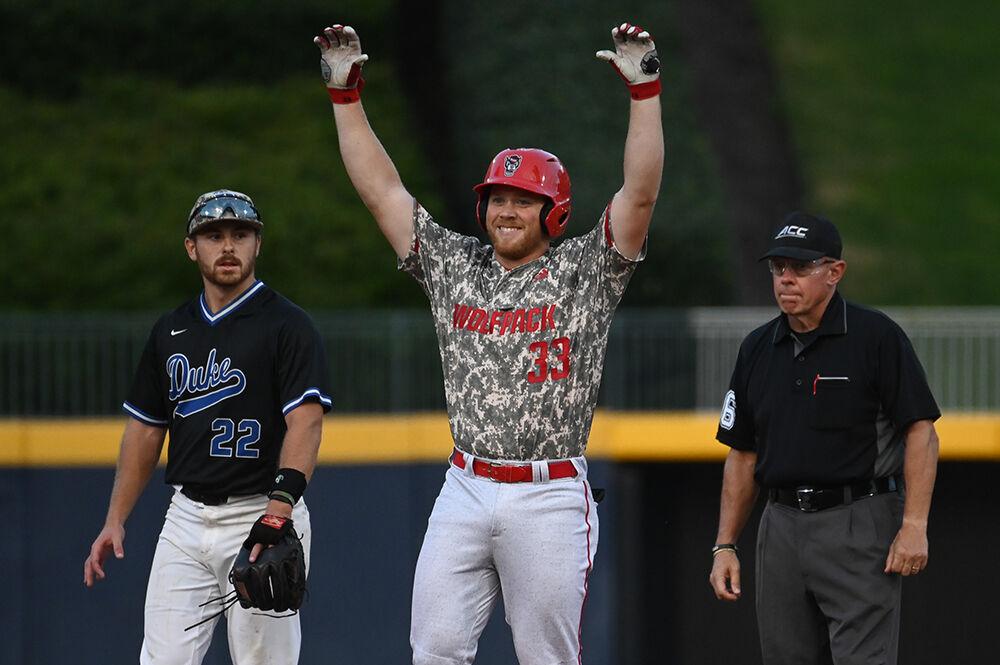 Graduate infielder Garrett Pennington celebrates making it to second base during the Wolfpack's fall-ball game against the Duke Blue Devils at the Durham Bulls Athletic Park on Friday, Oct. 13, 2023. The Wolfpack beat the Blue Devils 10-3 in game one and 5-1 in game two of the doubleheader event.