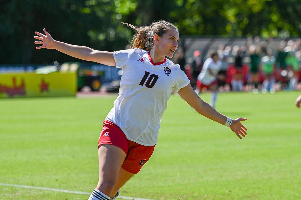 Junior midfielder Annika Wohner celebrates after scoring a goal against the Virginia Cavaliers at Dail Soccer Field on Sunday, Oct. 8, 2023. The Wolfpack beat the Cavaliers 2-1.