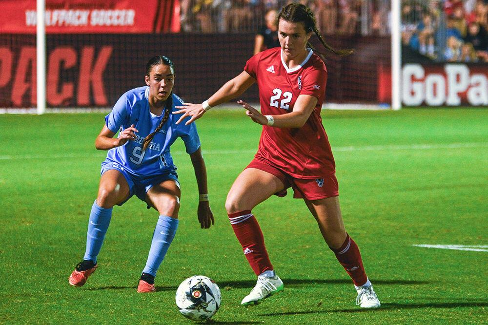 Sophomore defender Taylor Chism defends the ball against her opponent during the game against UNC-Chapel Hill at Dail Soccer Field on Saturday, Sept. 30, 2023. NC State lost 4-0 to Chapel Hill.