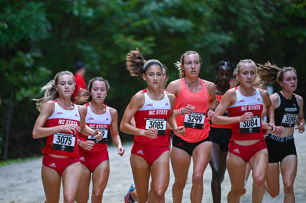 The women's cross country team runs in a pack during the Adidas XC Challenge on Friday, Sept. 16, 2022 at Wake Med Soccer Park. NC State won the women's 6k with a score of 17.