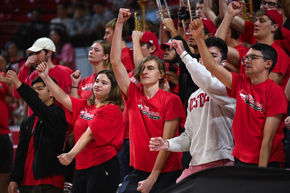 The NC State band dances for the crowd during the match against Pitt at Reynolds Coliseum on Friday, Oct. 20, 2023. NC State lost to Pitt 3-0.