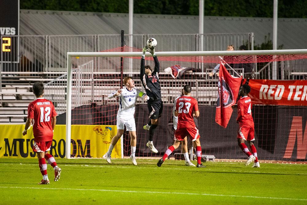 Freshman goalkeeper Samuel Terranova saves the ball from going into the net during the match against High Point University at Dail Soccer Field on Tuesday, Oct. 17, 2023. Terranova had 4 saves during the game. NC State tied High Point 0-0.
