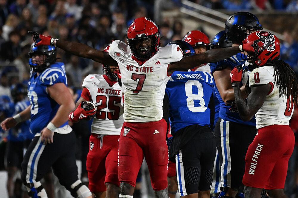 Redshirt junior cornerback Shyheim Battle waves his arms to celebrate an incomplete pass during the Wolfpack's game against the Duke Blue Devils at Wallace Wade Stadium on Saturday, Oct. 14, 2023. Battle recorded on interception and two tackles. The Blue Devils defeated the Wolfpack 24-3.
