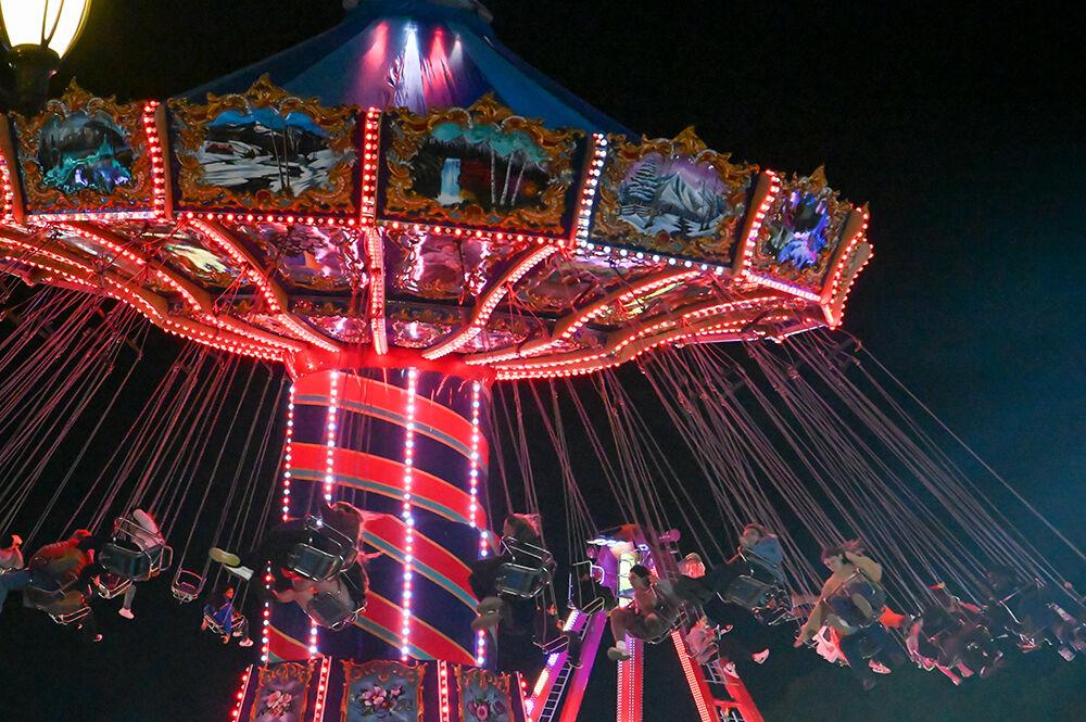 The ride spins fairgoers at the North Carolina State Fair in Raleigh on Sunday, Oct. 15, 2023. The fair was held from Oct. 12-22, 2023.