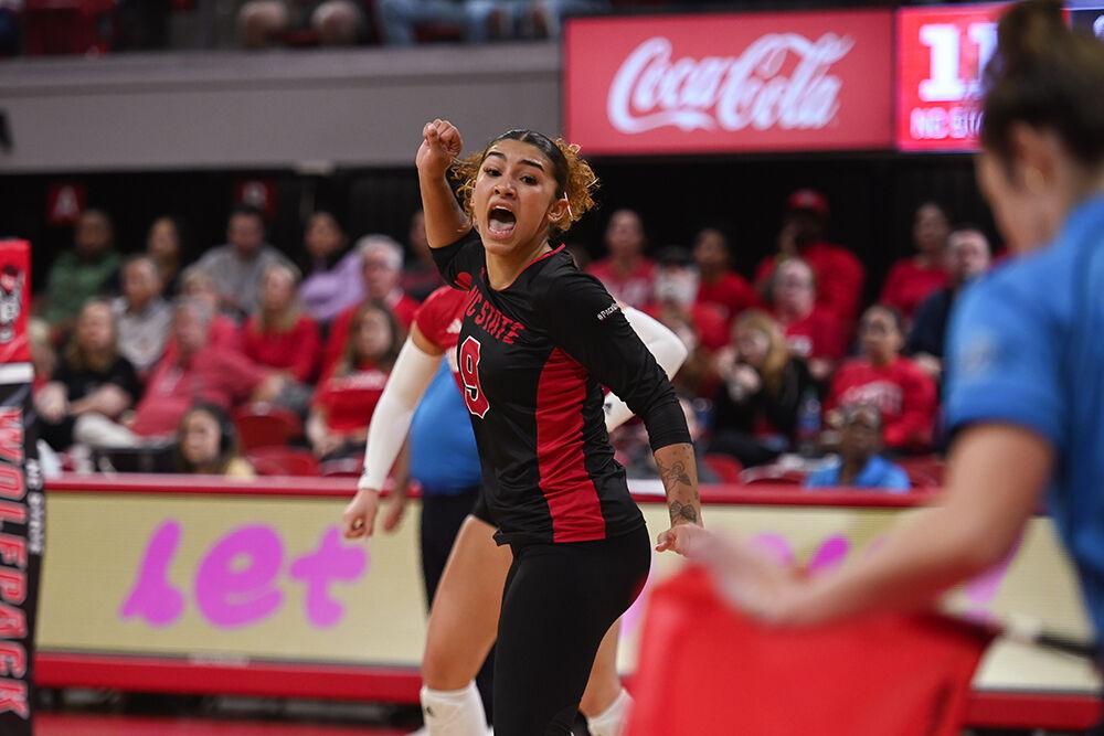 Senior libero Skye Stokes celebrates after scoring a point during the match against Pitt at Reynolds Coliseum on Friday, Oct. 20, 2023. NC State lost to Pitt 3-0.