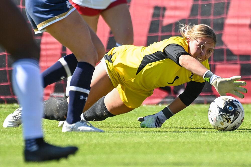 Junior goalkeeper Olivia Pratapas saves the ball during the match against Notre Dame at Dail Soccer Field on Sunday, Oct. 22, 2023. Pratapas made four saves for the Wolfpack. NC State lost to Notre Dame 1-0.