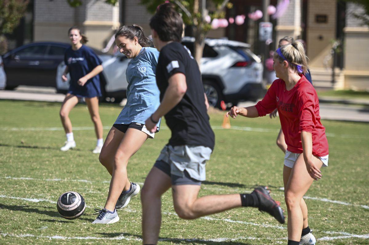 Amanda Campos, a third-year studying political science, keeps the ball away from the other team during the El Salvador Soccer Tournament at Stewardship Park on Saturday, Oct. 21, 2023. The tournament served as a fundraiser for Perseverancia, a nonprofit whose purpose is to leave a positive impact on the education system in Central America.