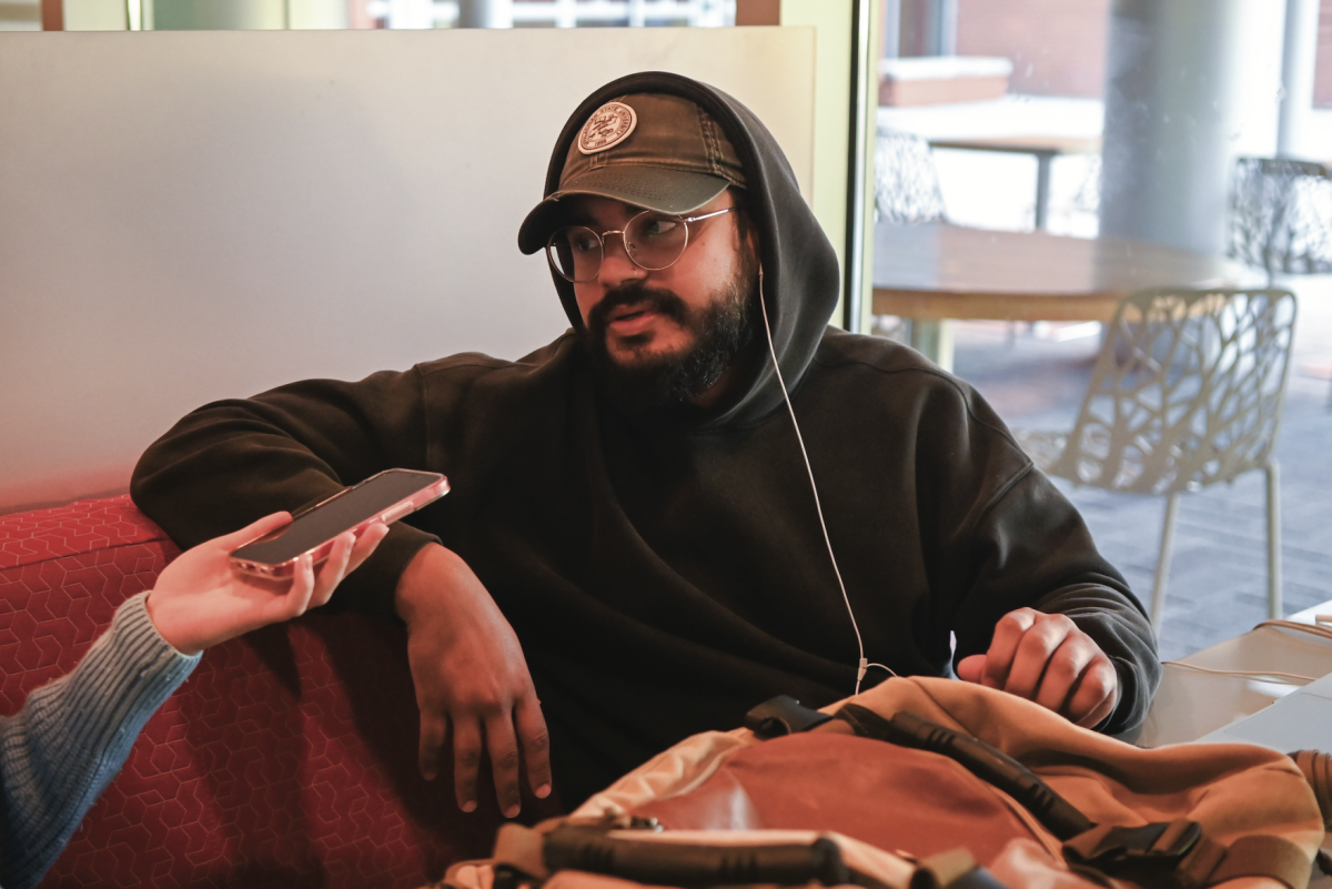 Federico Araujo, an NC State Alum who studied sustainable materials and technology, is interviewed in Talley Student Union on Wednesday, Nov. 1, 2023. Students were asked about their perspectives on vaping.