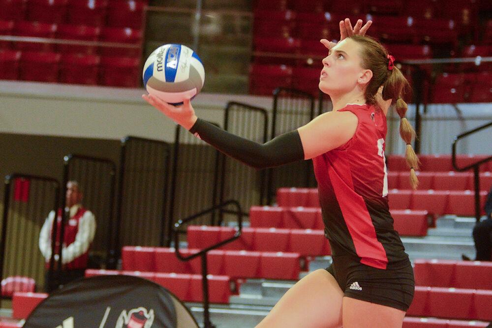 Junior outside hitter Ava Brizard prepares to serve the ball during the volleyball match against Syracuse at Reynolds Coliseum on Sunday, Nov. 5, 2023. NC State beat Syracuse 3-0.