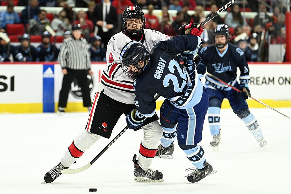 Zach Herman, a second-year in business administration, skates through the defense during the game against UNC-Chapel Hill in PNC Arena on Monday, Nov. 20, 2023. NC State lost to Chapel Hill 5-3.