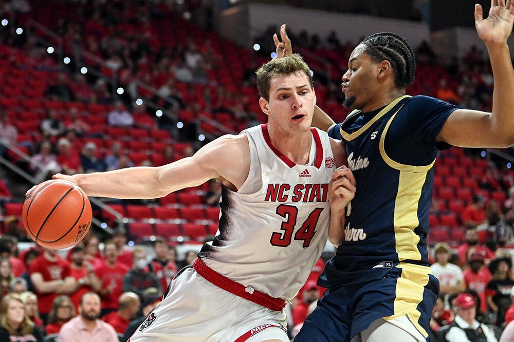 Junior forward Ben Middlebrooks drives into the defender during the game against Charleston Southern in PNC Arena on Friday, Nov. 17, 2023. Middlebrooks scored nine points and made three rebounds. NC State beat Charleston Southern 87-53.