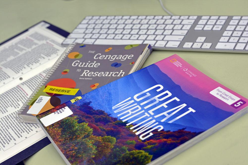 Cengage textbooks sit on a table in D.H. Hill Jr. Library on Tuesday, Sept. 18, 2018. Cengage allows you to access Webassign codes without requiring you to pay individually.&#160;