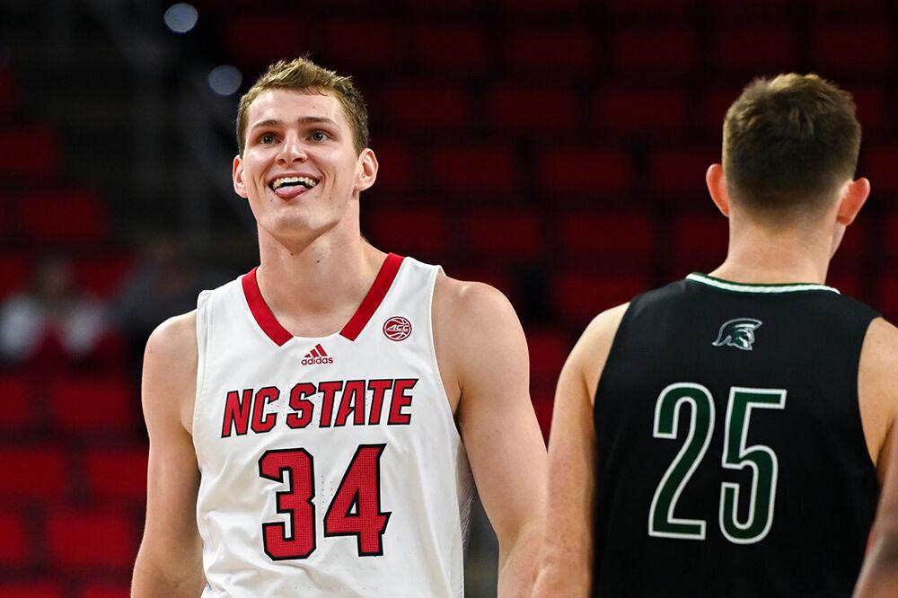 Junior forward Ben Middlebrooks sticks his tongue out after a turnover by the Mount Olive Trojans in PNC Arena on Wednesday, Nov. 1, 2023. Middlebrooks had seven rebounds against Mount Olive. The Wolfpack beat the Trojans 89-79.
