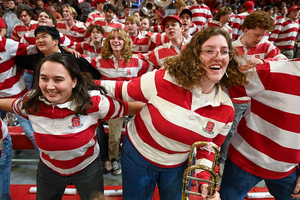 The NC State Pep Band dances to Swag Surfin' before the NC State women's basketball team's matchup versus the UConn Huskies in Reynolds Coliseum on Sunday, Nov. 12, 2023. The Wolfpack beat the Huskies 92-81.