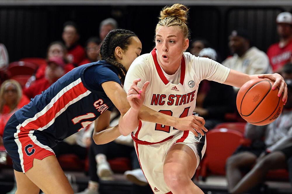 Freshman guard Laci Steele drives the ball to the basket during the exhibition game against Catawba in Reynolds Coliseum on Thursday, Nov. 2, 2023. NC State beat Catawba 101-58.