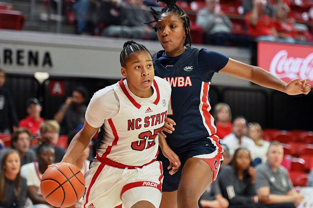 Freshman guard Zoe Brooks drives the ball to the basket during the exhibition game versus Catawba on Thursday, Nov. 2, 2023. Brooks scored 13 points for NC State. NC State beat Catawba 101-58.
