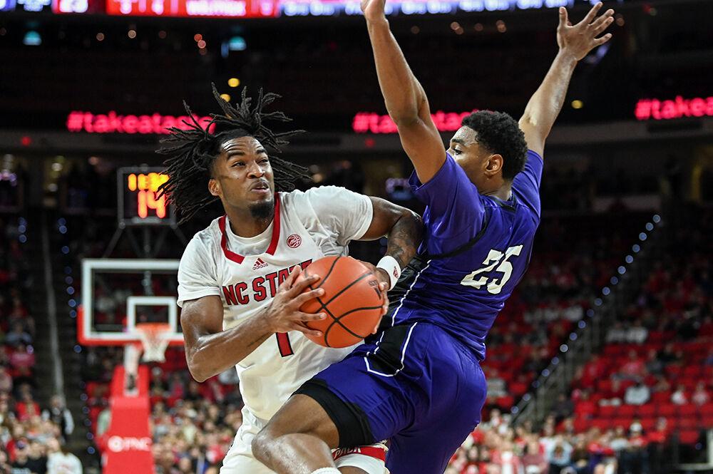 Sophomore guard Jayden Taylor drives the ball to the basket during the game against Abilene Christian in PNC Arena on Friday, Nov. 10, 2023. Taylor led in scoring with 22 points. NC State beat Abilene Christian 84-64.