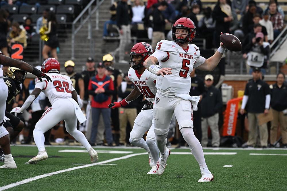 Graduate quarterback Brennan Armstrong completes a pass during the Wolfpack's game against the Wake Forest Demon Deacons in Allegacy Federal Credit Union Stadium on Saturday, Nov. 11, 2023. Armstrong completed 12 passes on 70.6% accuracy for 111 yards and recorded one passing and one rushing touchdown. The Wolfpack beat the Demon Deacons 26-6.