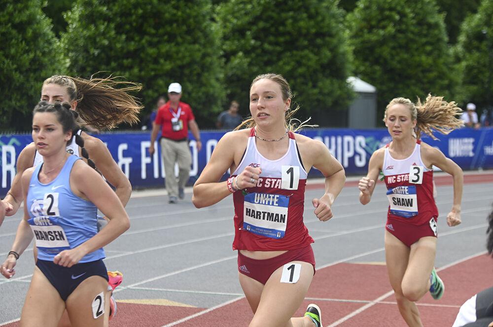 Freshman distance runner Grace Hartman and graduate mid-distance runner Savannah Shaw come around the curve during the women 1500m finals event of the outdoor track ACC championships at the&#160;Paul Derr Track and Field Facility on Saturday, May 13, 2023.
