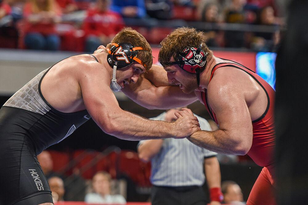 Redshirt sophomore Owen Trephan locks arms with his opponent during the ACC Wrestling Championship in Reynolds Coliseum on Sunday, March 5, 2023. Trephan won the championship for the 285 weight class.&#160;NC State won their fifth-consecutive ACC Championship with a score of 101.5.