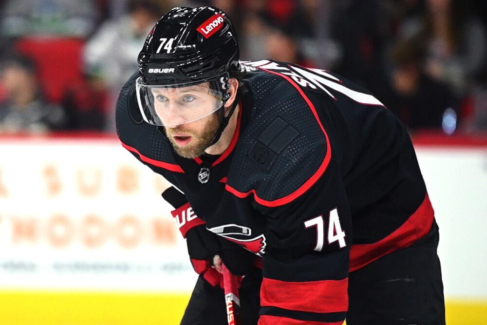 Defenseman Jaccob Slavin waits for the puck to drop during the Carolina Hurricanes game versus the Pittsburgh Penguins at PNC Arena on Saturday, Nov. 18, 2023. The Hurricanes beat the Penguins 4-2.