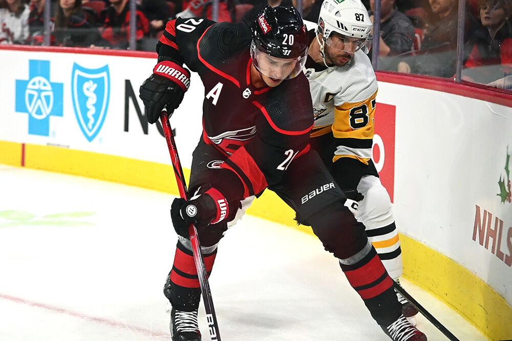 Center Sebastian Aho fights for the puck during the Carolina Hurricanes game versus the Pittsburgh Penguins at PNC Arena on Saturday, Nov. 18, 2023. The Hurricanes beat the Penguins 4-2. Aho scored one goal for the Hurricanes.