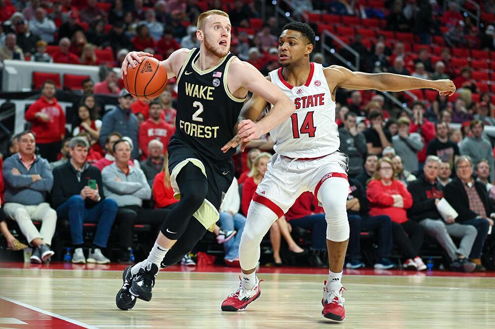 Graduate guard Casey Morsell tries to fight off a Wake Forest basket in PNC Arena on Tuesday, Jan. 16, 2024. Morsell scored eight points against Wake Forest. The Wolfpack beat the Demon Deacons 83-76.