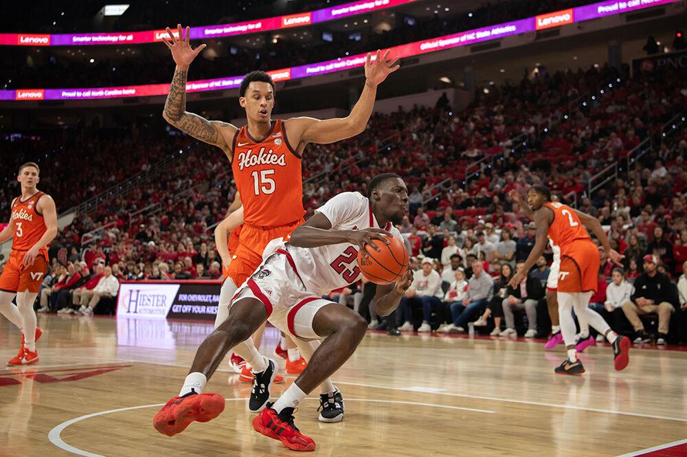 Junior forward Mohamed Diarra loses his balance during the game against Virginia Tech in PNC Arena on Saturday, Jan. 20, 2024. Diarra had eight rebounds and scored six points during the game. NC State lost to Virginia Tech 84-78.