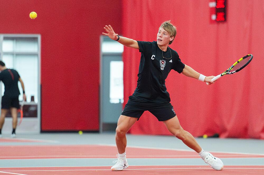 Junior Fons Van Sambeek prepares to forehand the ball during the match against Northwestern at J.W. Isenhour Tennis Center on Monday, Jan. 15, 2024. NC State won 6-1 to Northwestern.