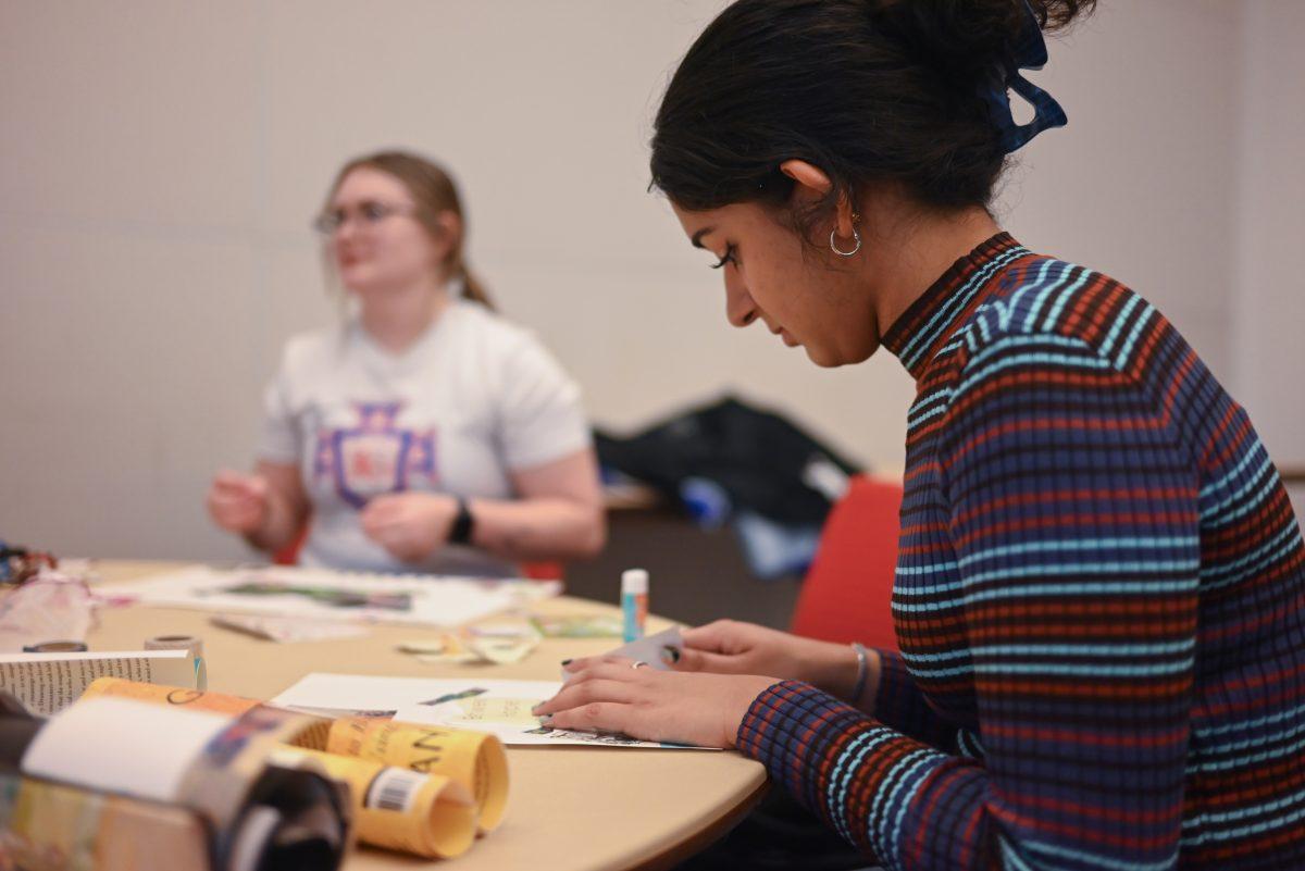 Saanika Naik, a first-year in industrial engineering, works on their vision board at the Create Your Own Vision event on Thursday, Jan. 11, 2024 in Talley Student Union. The Create Your Own Vision Board event focused on students setting positive goals for the year.