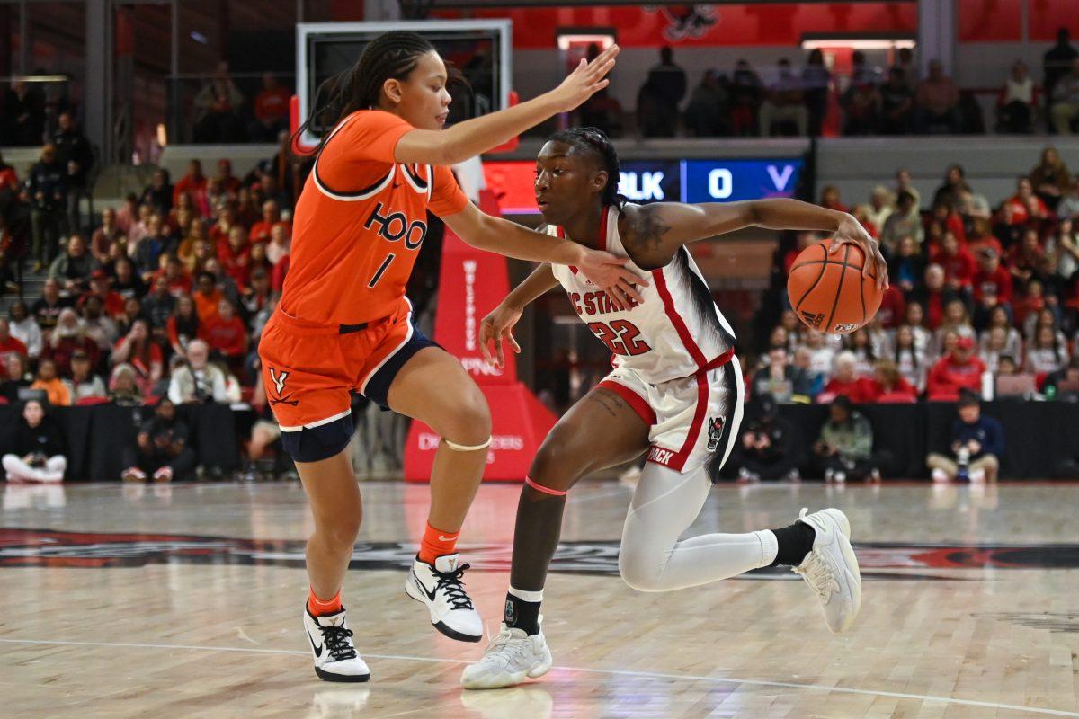 Junior guard Saniya Rivers drives towards the basket during the game against Virginia in Reynolds Coliseum on Thursday, Jan. 11, 2024. Rivers had seven assists and scored six points for the Wolfpack.&#160;The Wolfpack beat the Cavaliers 93-66.