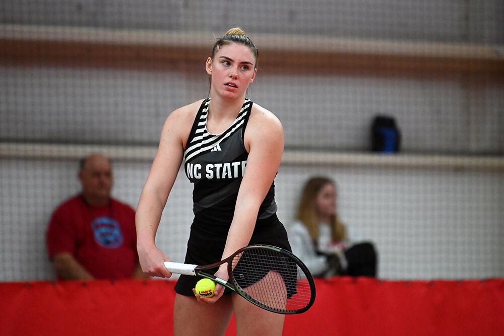 Senior Amelia Rajecki prepares to serve during the match against Clemson at J.W. Isenhour Tennis Center on Sunday, Jan. 28, 2024. Rajecki won both her singles and doubles matches. NC State beat Clemson 4-0.