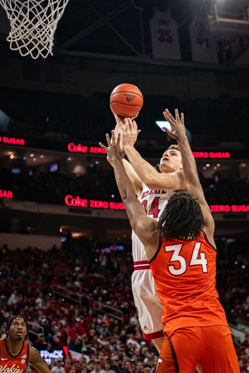 Junior forward Ben Middlebrooks jumps to shoot the ball during the game against Virginia Tech in PNC Arena on Saturday, Jan. 20, 2024. Middlebrooks had three rebounds and scored two points during the game. NC State lost to Virginia Tech 84-78.