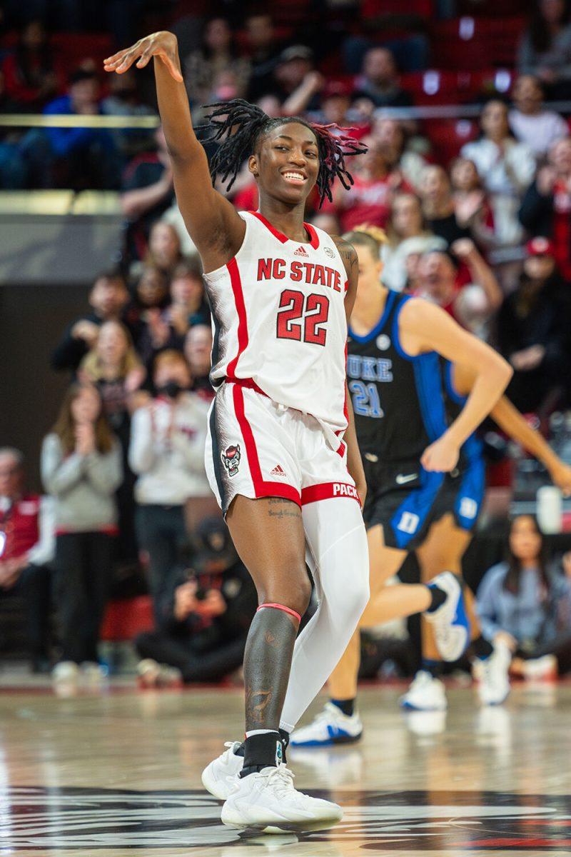 Junior guard Saniya Rivers celebrates after passing the ball to a teammate during the game against Duke in Reynolds Coliseum on Sunday, Jan. 21, 2024. Rivers had five assists and scored nine points for the Wolfpack.&#160;The Wolfpack beat the Blue Devils 72-57.