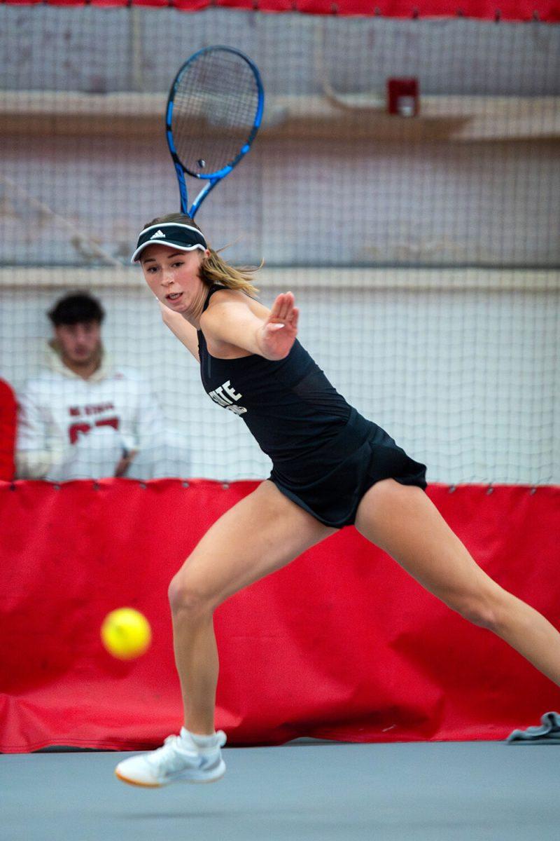 Freshman Kristina Paskauskas forehands the ball during the match against North Carolina Central at J.W. Isenhour Tennis Center on Saturday, Jan. 20, 2024. Paskauskas won her singles match 6-0, 6-2. NC State beat NC Central 7-0.