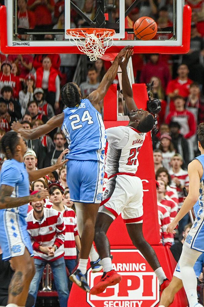 Junior forward Mohamed Diarra gets his shot blocked by UNC-Chapel Hill graduate forward Jae'Lyn Withers in PNC Arena on Wednesday, Jan. 10, 2024. Diarra scored 7 points and had 3 rebounds against UNC-Chapel Hill. The Tar Heels beat the Wolfpack 67-54.
