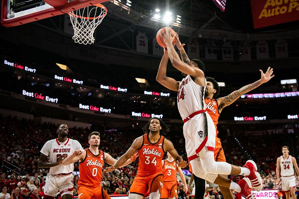 Graduate guard Casey Morsell jumps to shoot the ball during the game against Virginia Tech in PNC Arena on Saturday, Jan. 20, 2024. Morsell had three steals and scored 19 points during the game. NC State lost to Virginia Tech 84-78.