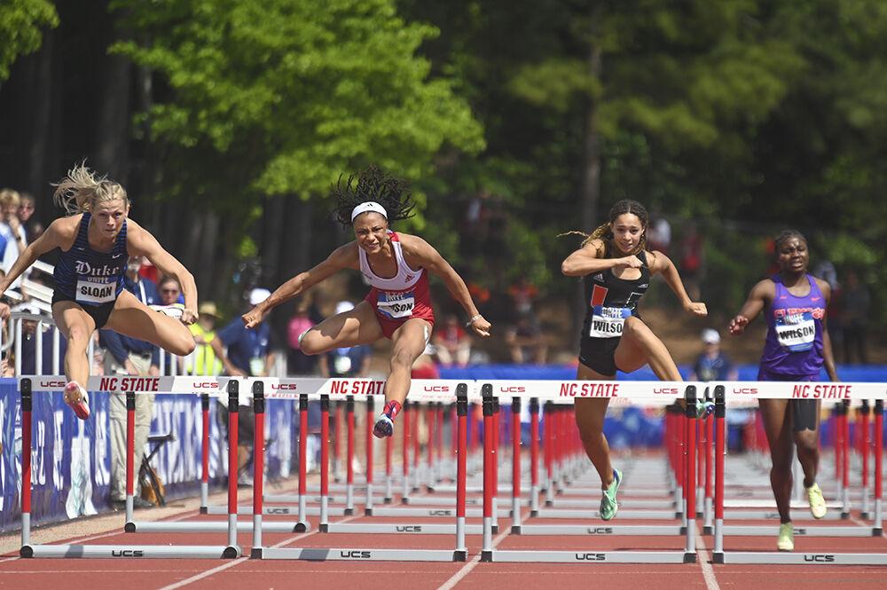 Senior sprinter Ally Henson scales the hurdle during the outdoor track ACC championships at the&#160;Paul Derr Track and Field Facility on Saturday, May 13, 2023. Henson ran a personal best time of 13.36 in the 100m hurdles finals.