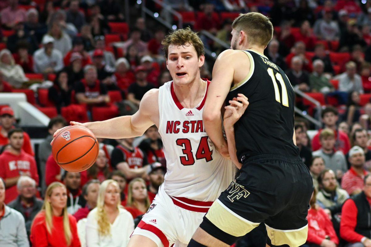 Junior forward Ben Middlebrooks pushes to the basket during the game versus the Wake Forest Demon Deacons in PNC Arena on Tuesday, Jan. 16, 2024. Middlebrooks scored 14 points and had 6 rebounds against Wake Forest. The Wolfpack beat the Demon Deacons 83-76.