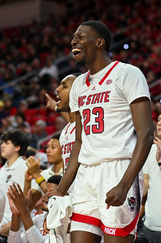 Junior forward Mohamed Diarra celebrates the Wolfpack lead in the late second half over the Wake Forest Demon Deacons in PNC Arena on Tuesday, Jan. 16, 2024. Diarra scored 8 points and had 13 rebounds against Wake Forest before being ejected in the final minutes of the game. The Wolfpack beat the Demon Deacons 83-76.