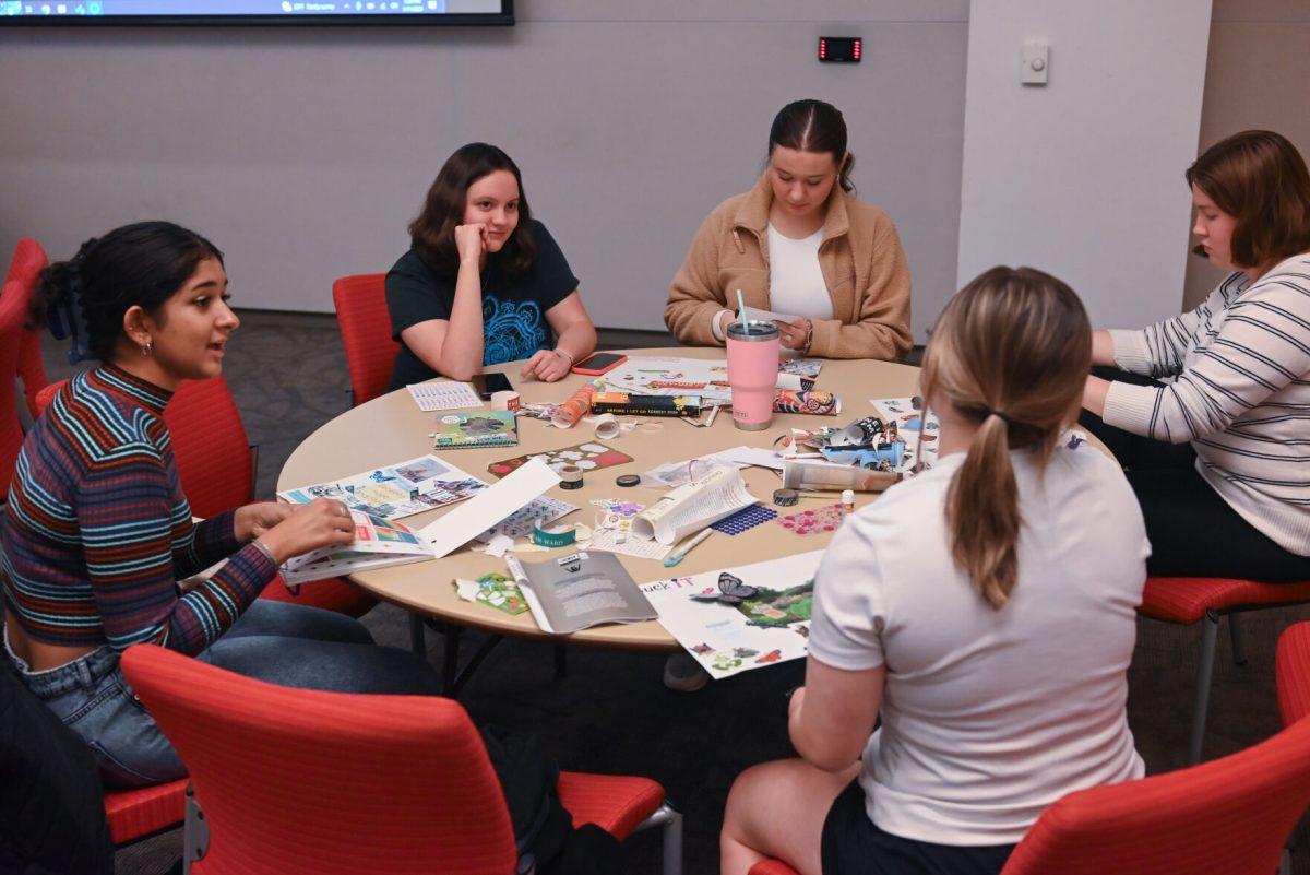 NC State students working on vision boards at the Create Your Own Vision event on Thursday, Jan. 11, 2024 in Talley Student Union. The Create Your Own Vision Board event focused on students setting positive goals for the year.