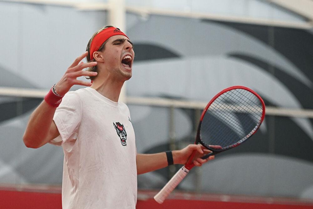 Senior Robin Catry celebrates a point during the match against Princeton at J.W. Isenhour Tennis Center on Friday, Jan. 19, 2024. Catry won his singles match 7-5, 6-1. NC State beat Princeton 7-0.