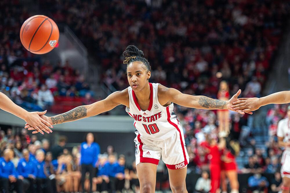 Junior guard Aziaha James high-fives teammates during the game against Duke in Reynolds Coliseum on Sunday, Jan. 21, 2024. James had two assists and scored 33 points for the Wolfpack.&#160;The Wolfpack beat the Blue Devils 72-57.